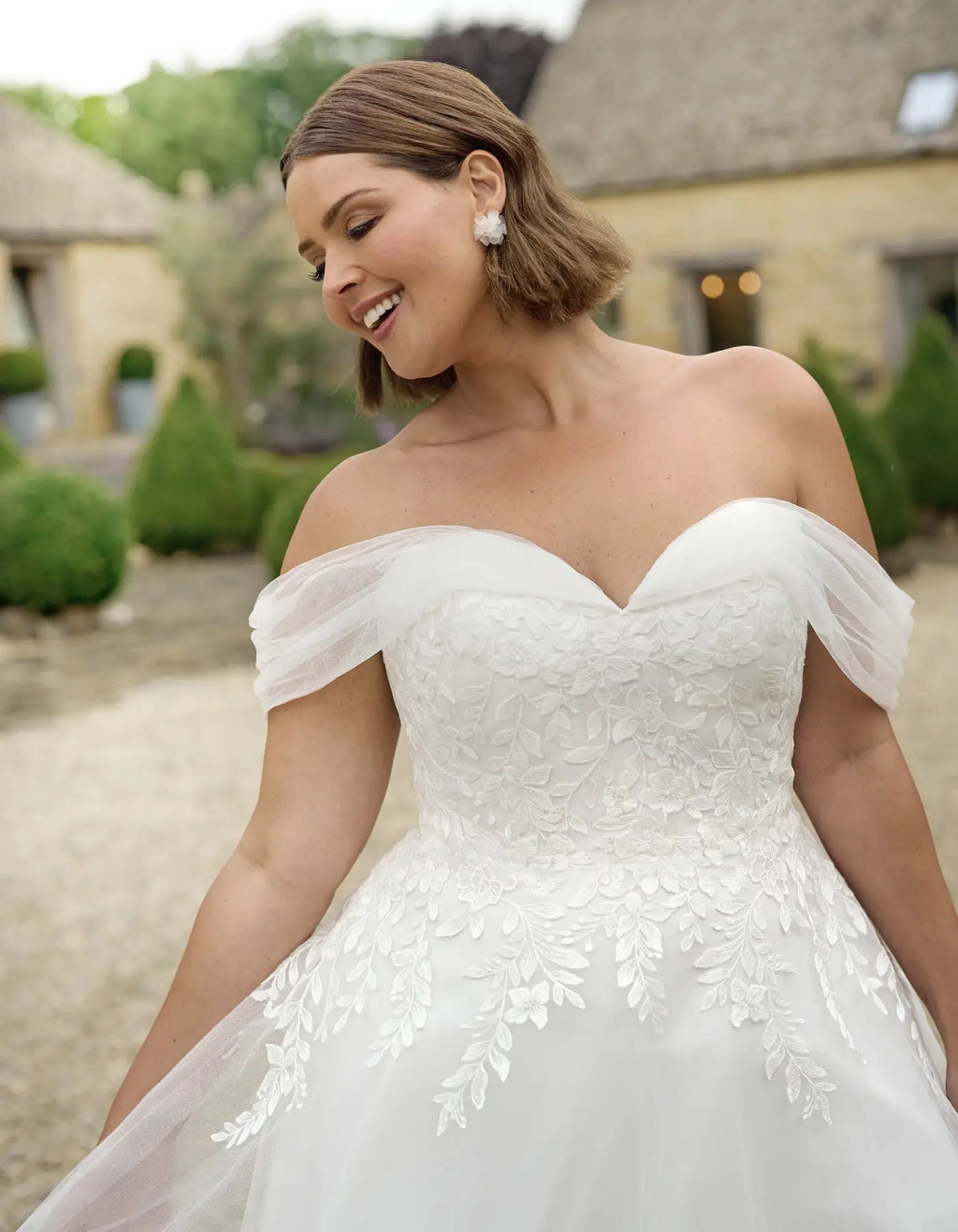 an off-the-shoulder a-line