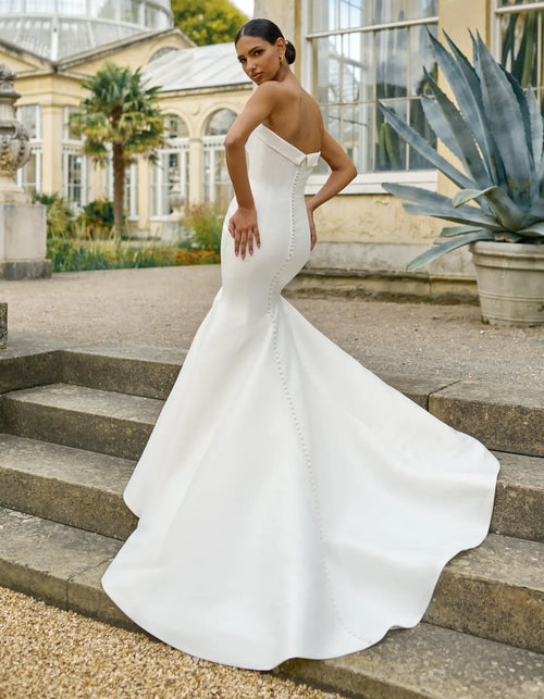 a simple mermaid gown with buttons