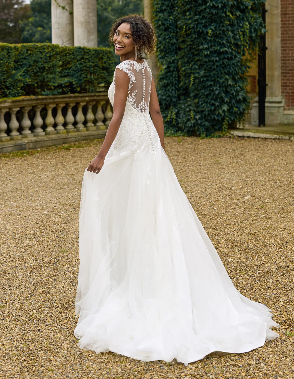 a beaded floral fit & flare wedding dress
